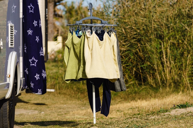 drying clothes outside beside car