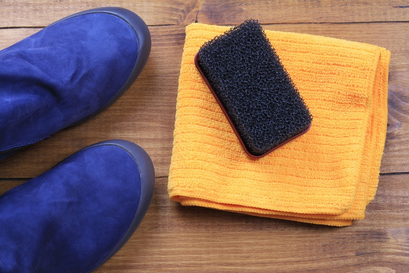 suede shoes, cloth and brush