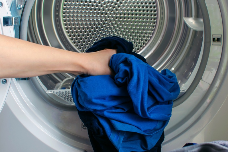 tumble drying clothes