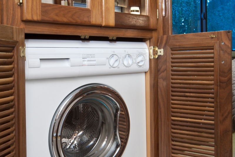 washing machine put in a cupboard