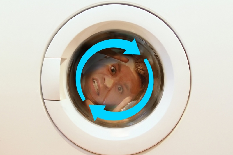 man spins in washing machine