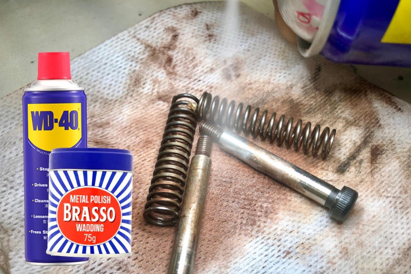 remove rust from chrome with wd-40 and brasso