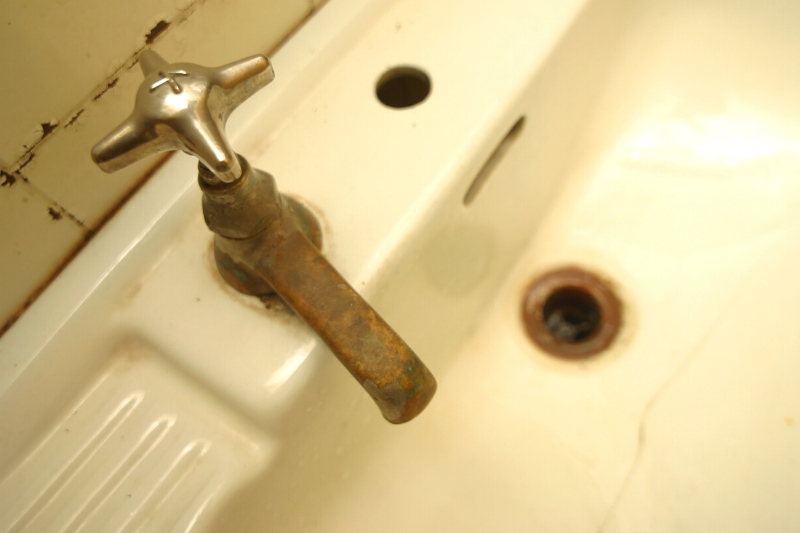 rusty sink and faucet