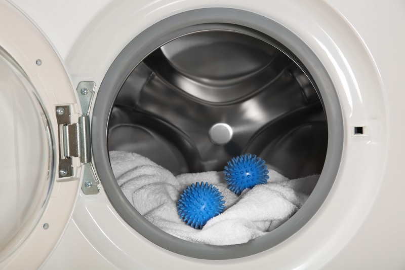 Plastic dryer balls in washing machine