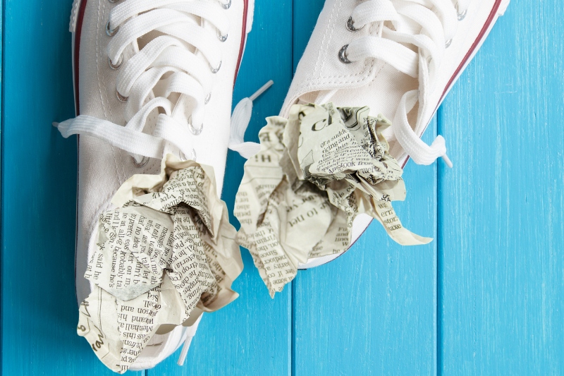 canvas shoes stuffed with newspaper
