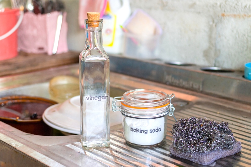 clean kitchen sink with baking soda and vinegar