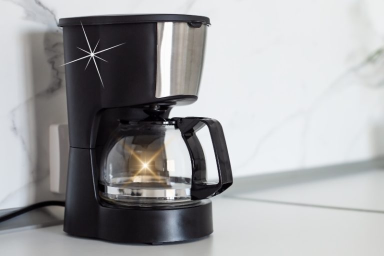 Clean coffee machine with white vinegar