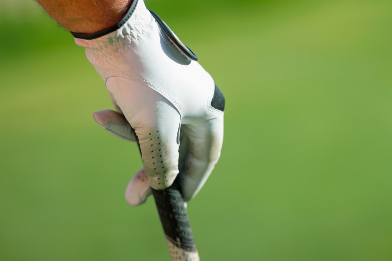 golf gloves with grass stain