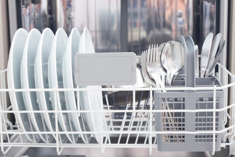 plates and utensils in dishwasher