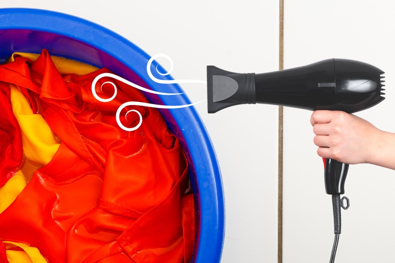 drying clothes with a hair dryer