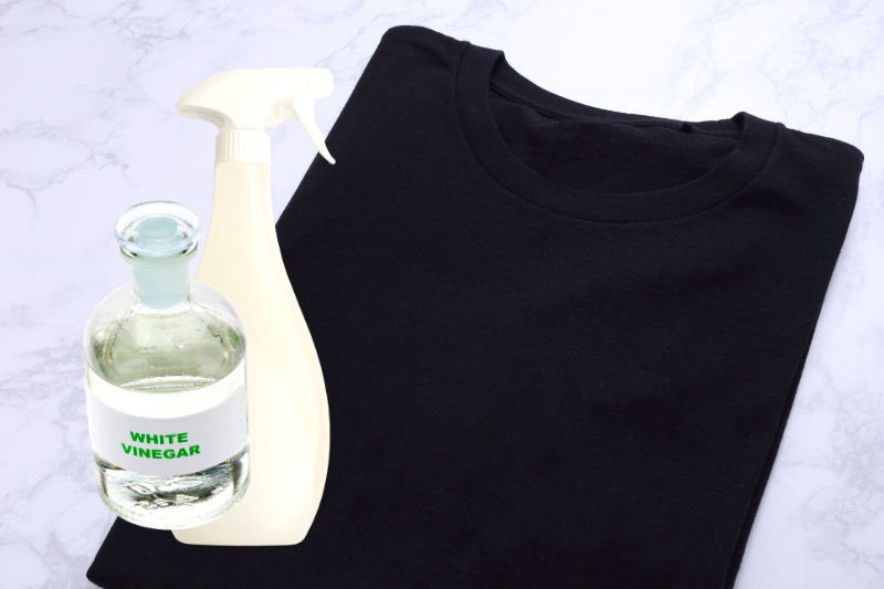 freshen clothes with white vinegar spray