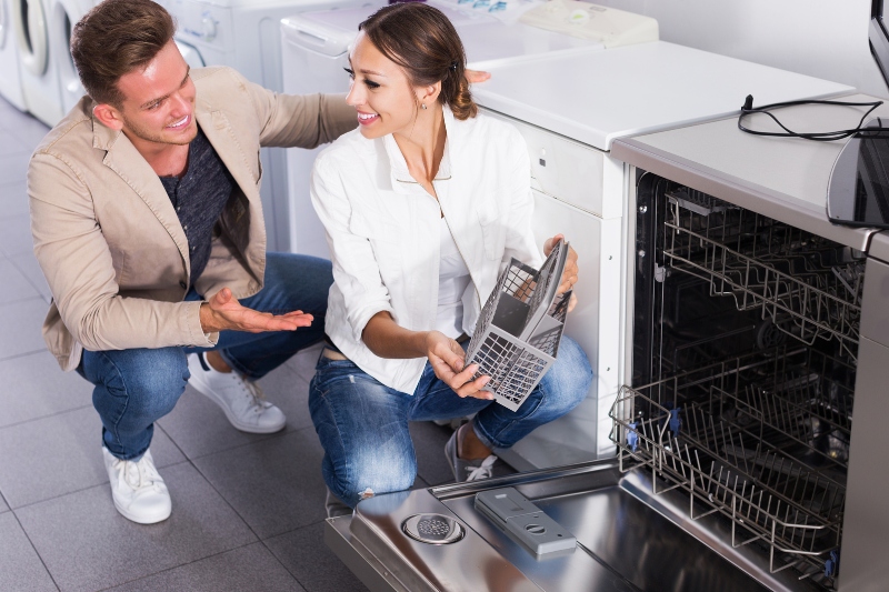 man and woman buying dishwasher