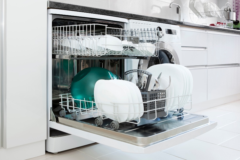 open dishwasher with dishes