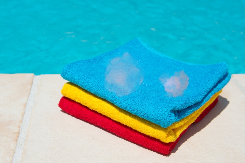pink towel stains due to pool water