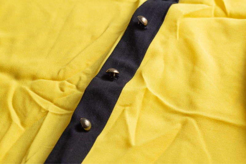 yellow blouse with buttons