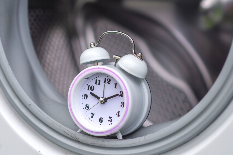 alarm clock on washing machine drum