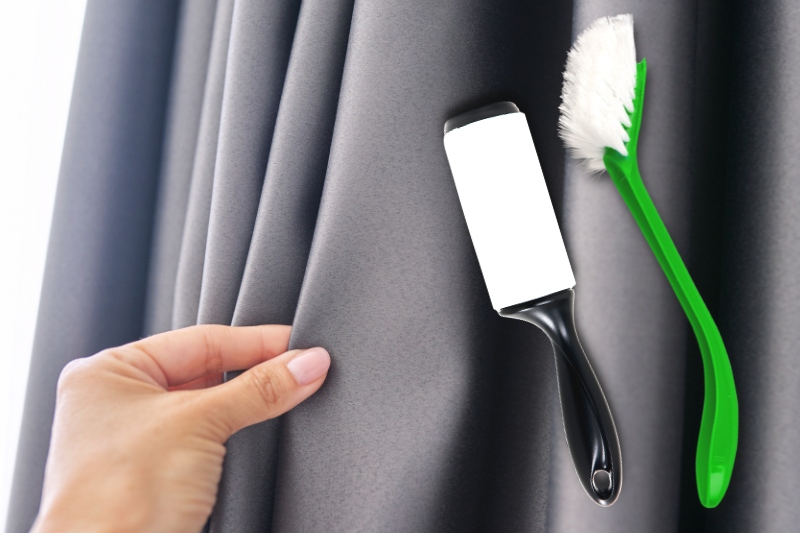 clean curtain with brush or lint roller