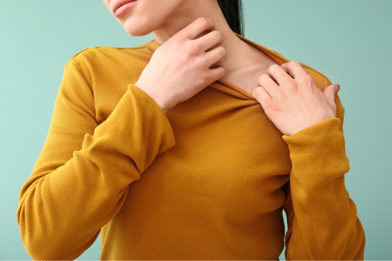 woman scratching itchy skin