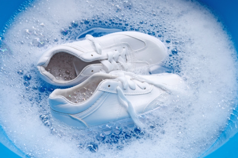 white rubber shoes in blue bowl