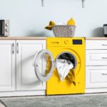 yellow washing machine in the kitchen