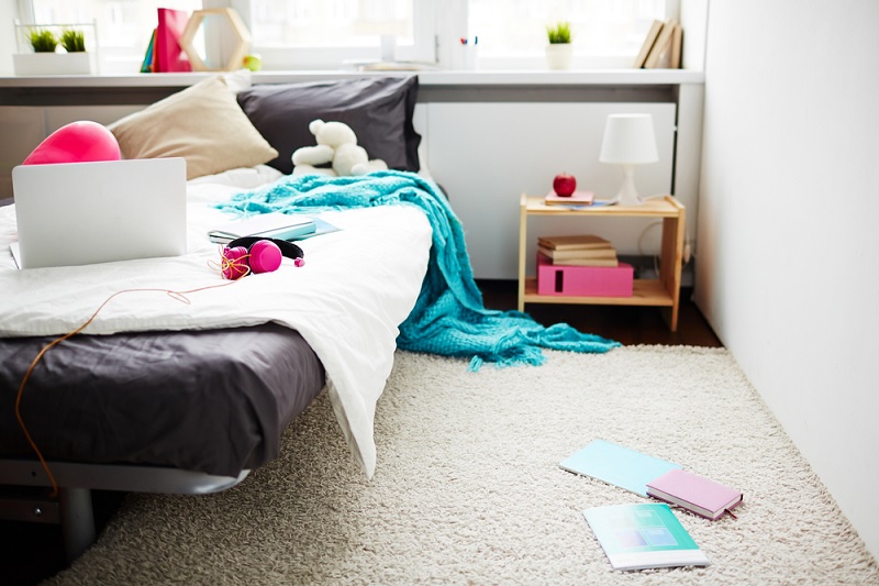 Books on bedroom floor