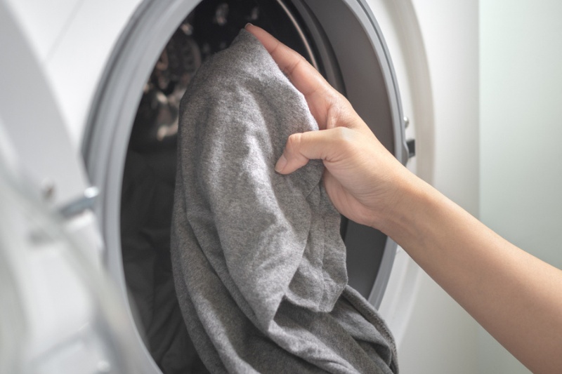 gray pillowcase in the washing machine