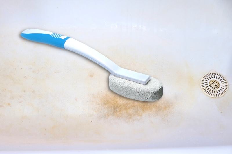 remove bathtub rust stains with pumice stone