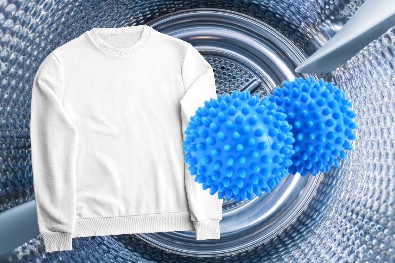 sweatshirt, dryer balls and tumble dryer