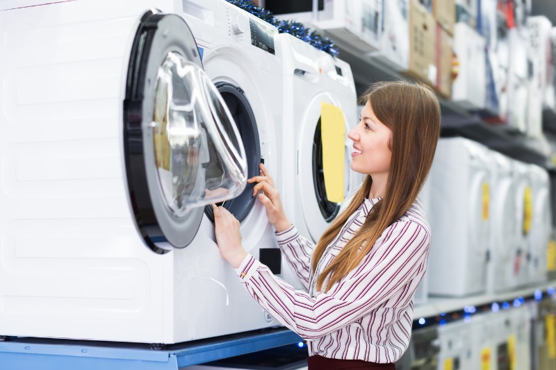 woman buying a washing machine