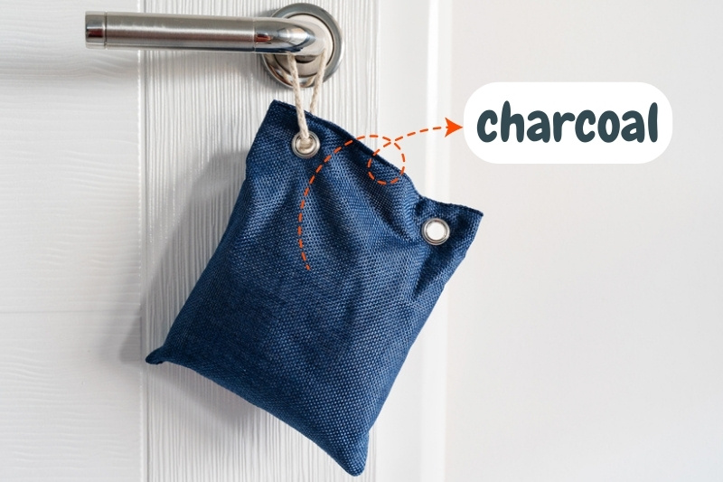charcoal bag hanging on door knob