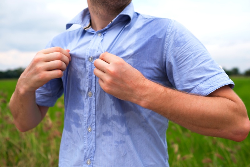 man that is excessively sweating or has hyperhidrosis