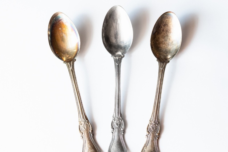 tarnished silver spoons