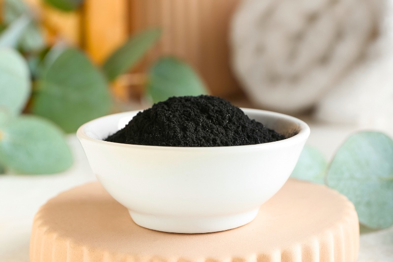 activated charcoal powder in a bowl