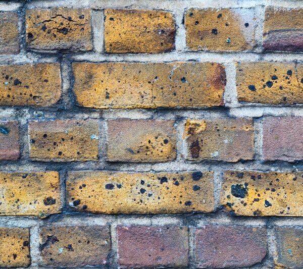 brick wall with black soot