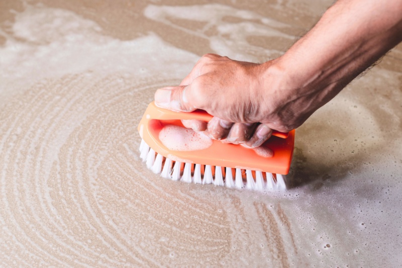 brushing floor