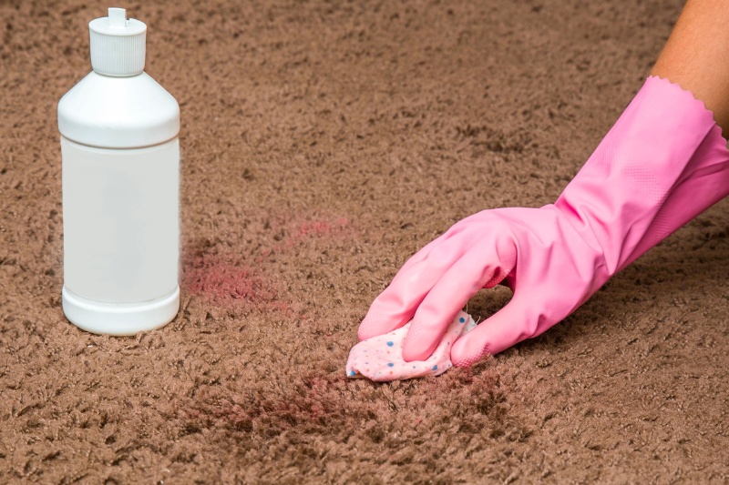 cleaning carpet with commercial cleaner