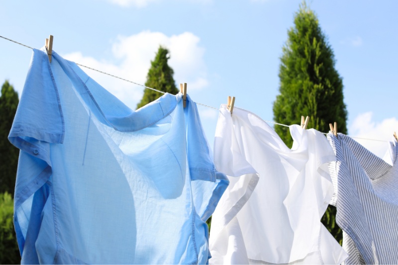 hang clothes outside to dry under the sun