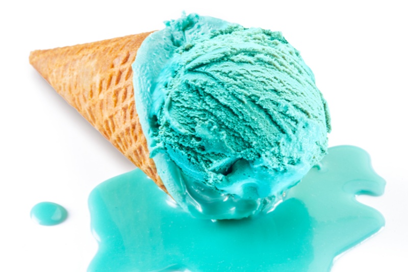 melted blue ice cream in cone