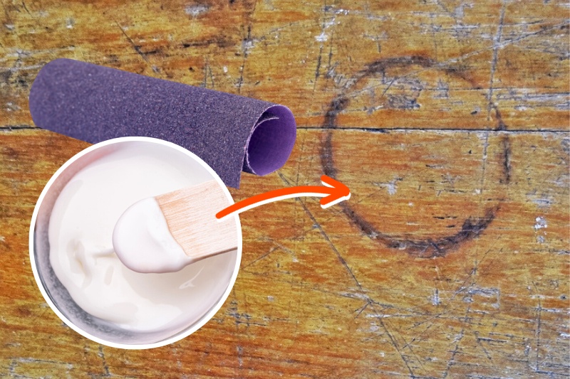 remove burn stains on wood with baking soda paste and sand paper