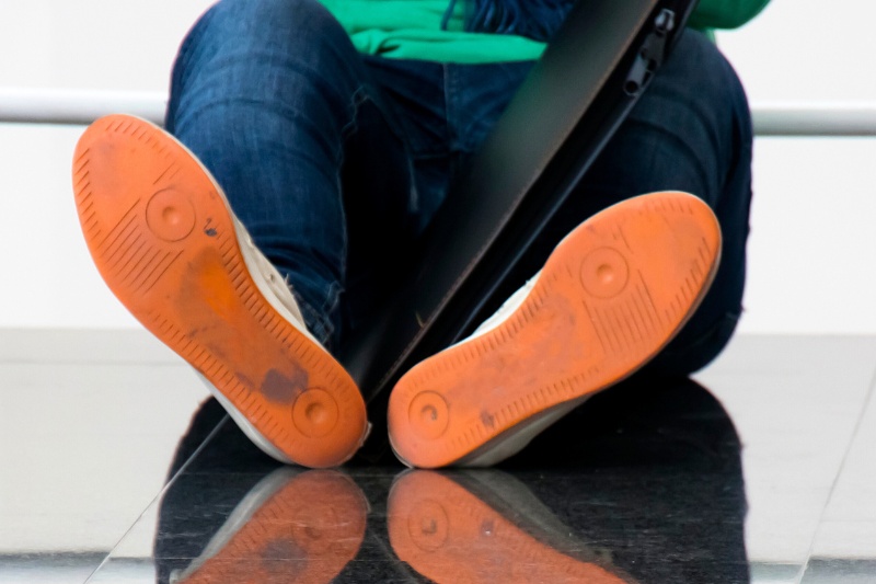 shoes with dirty orange soles