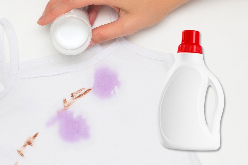 treat stains with liquid laundry detergent