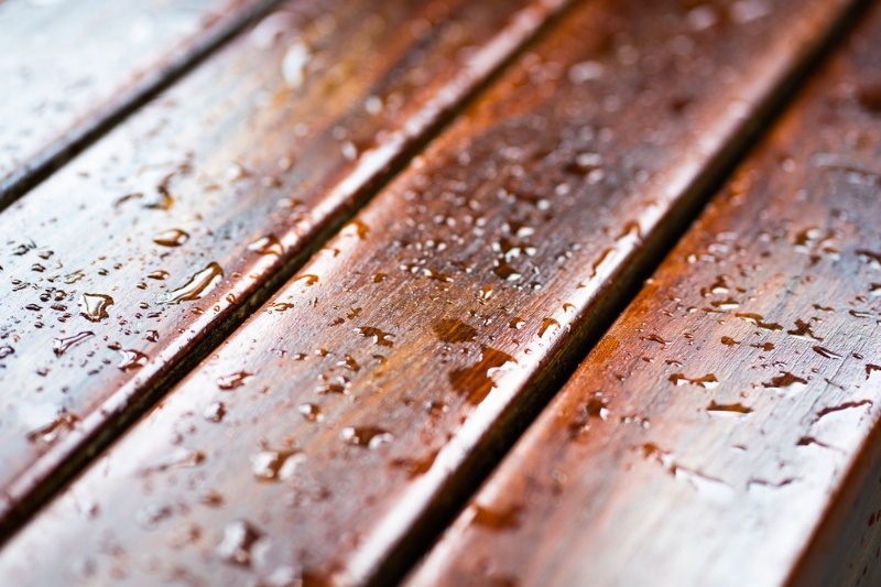 water drops on lacquered wood