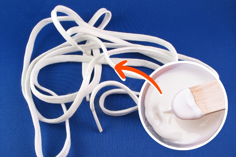 white shoelaces and bicarbonate of soda paste