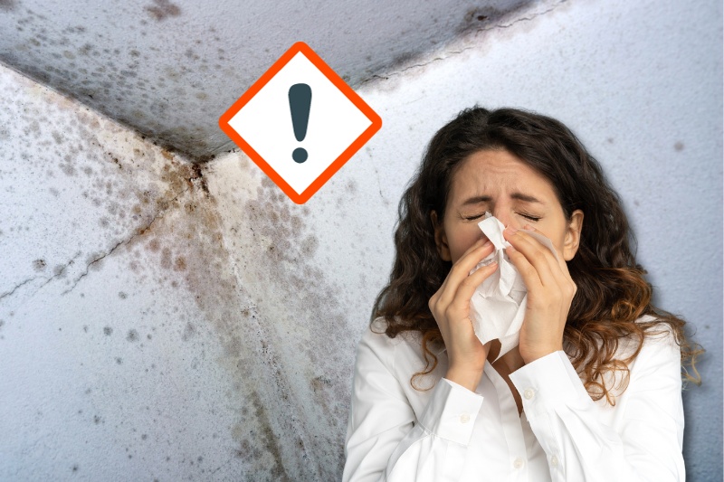 woman sneezing due to moulds