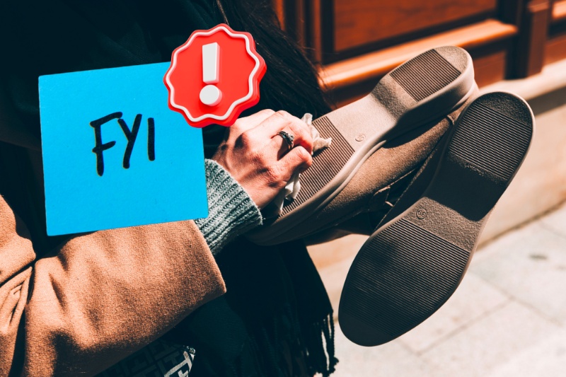 woman wiping shoe sole