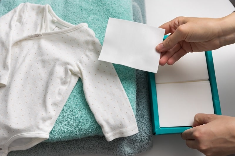 Laundry sheet with baby clothes