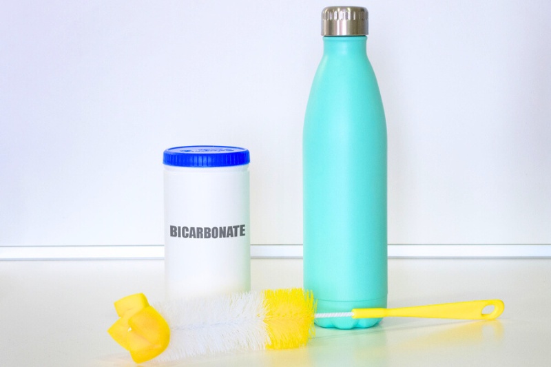 clean flask with bicarbonate of soda
