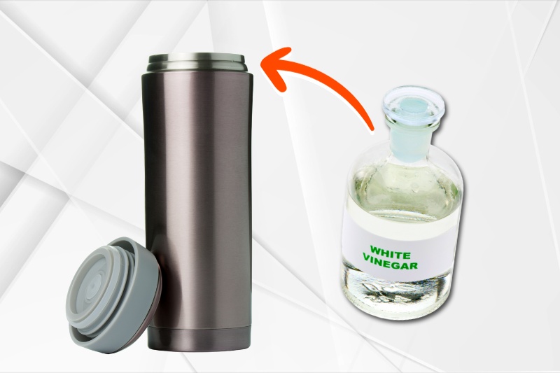 clean flask with white vinegar