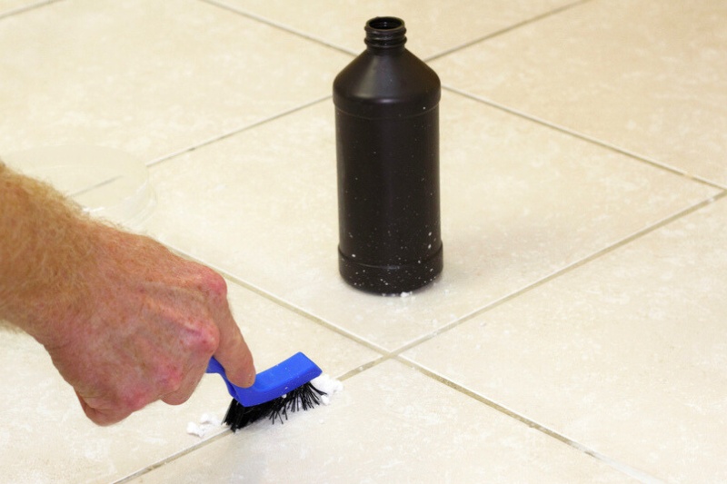 clean tile grout with baking soda and hydrogen peroxide