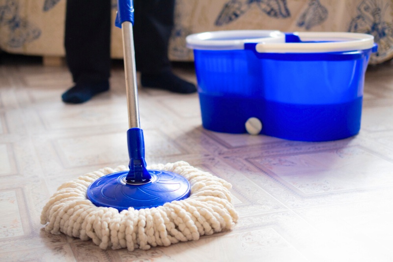 cleaning the floor with mop
